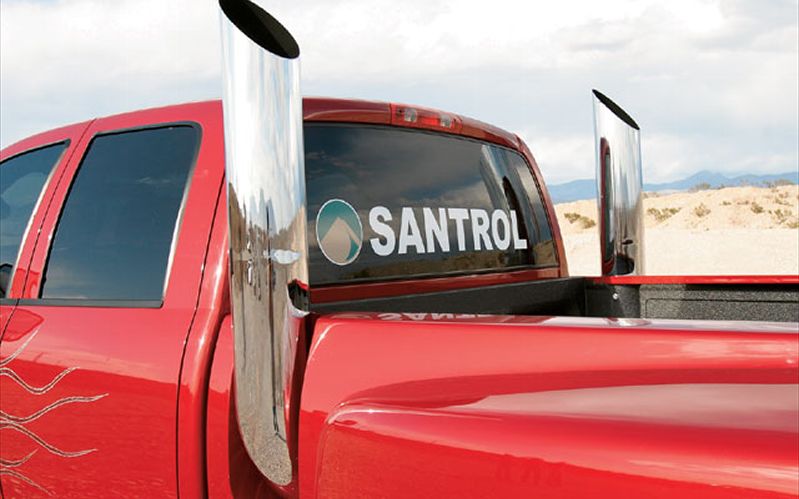 Red dodge truck with stacks