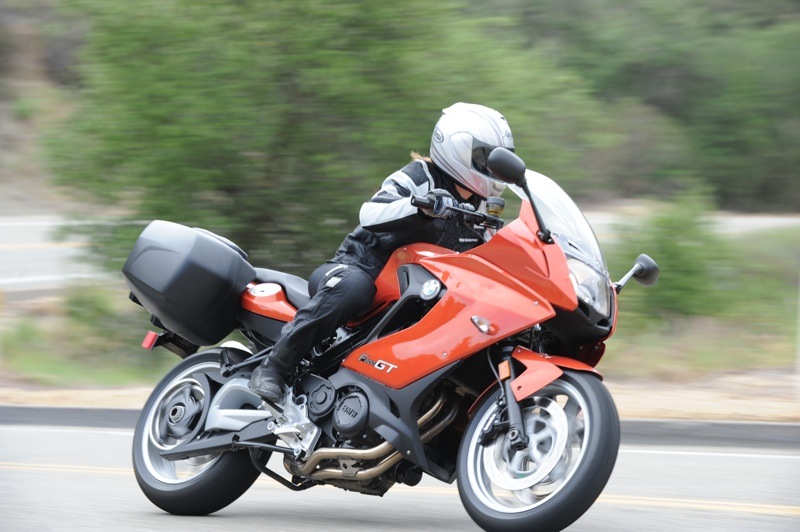 Man taking a sharp corner on a motorcycle