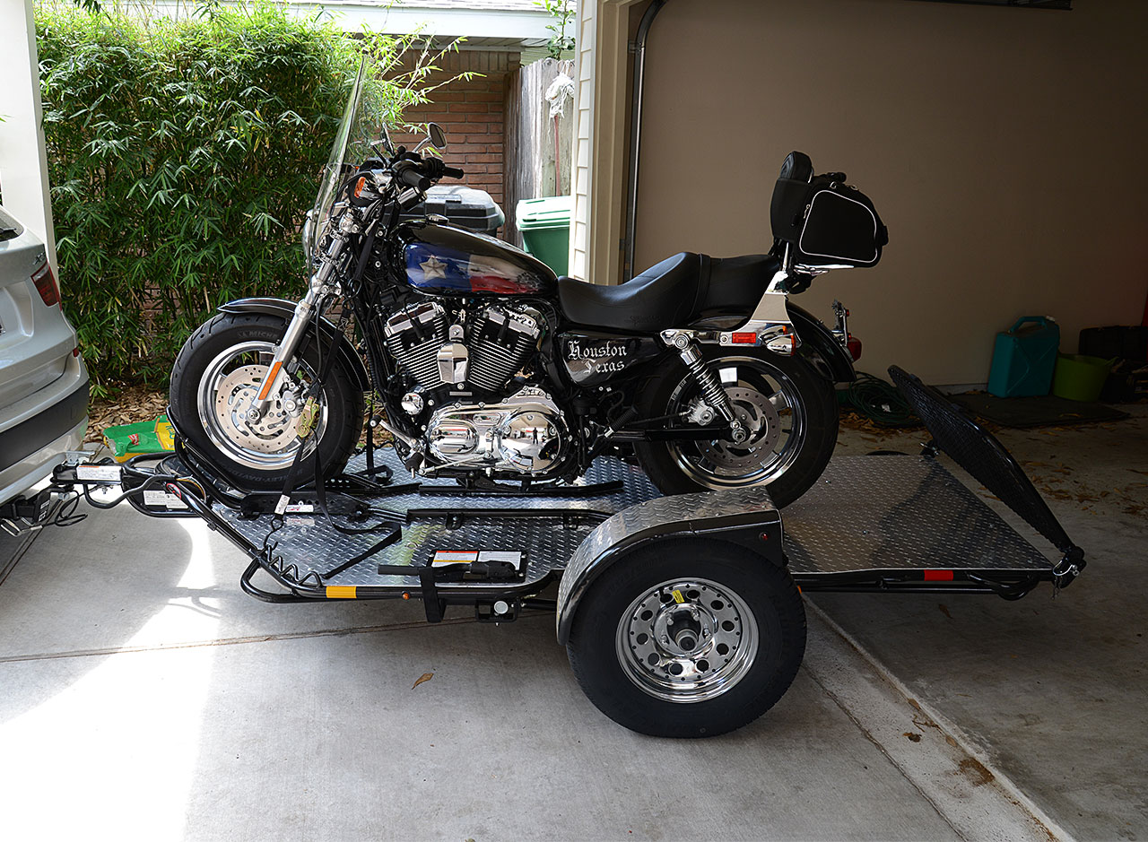  Showcasing a motorcycle on a simple drop motorcycle trailer