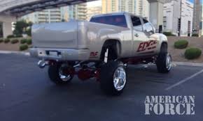 White Ford dually jacked with wheels