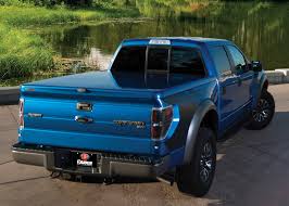 Blue Ford F-150 with hard tonneau cover