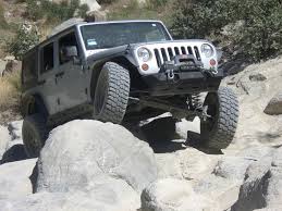 Jeep Wrangler climbing rocks