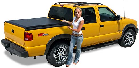 Yellow truck covered with a soft tonneau cover