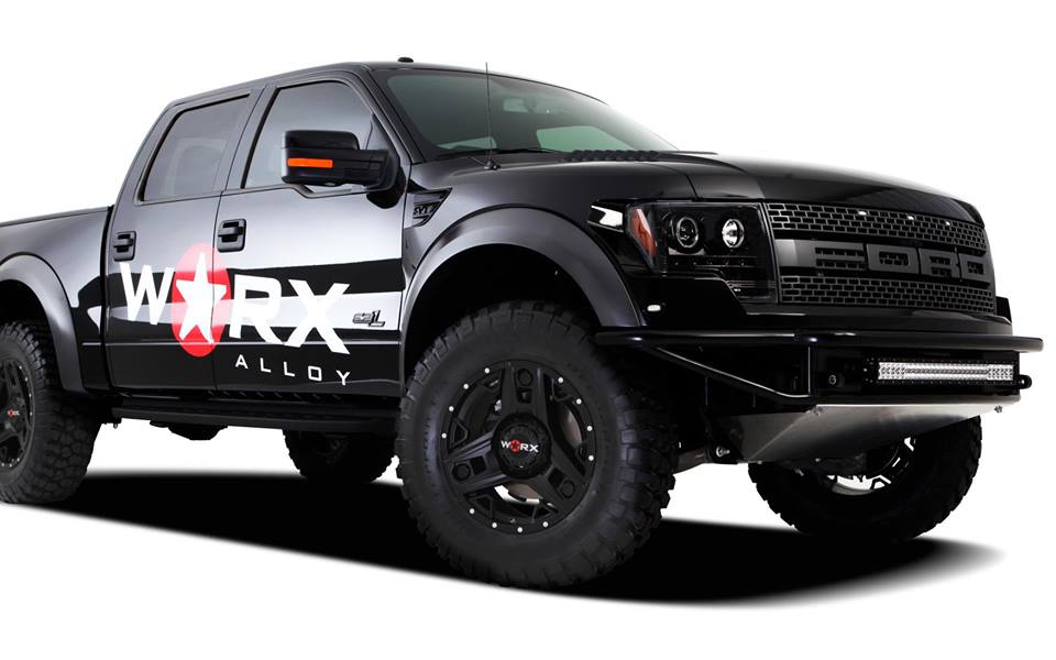 Black truck with Worx wheels logo