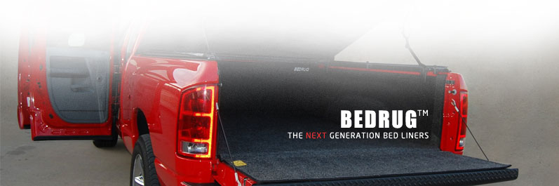 Red truck with BedRug bed liner from different angel