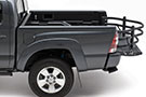 Amp Research BedXTender HD Moto installed on a black pickup truck
