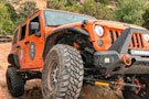 Jeep Wrangler JK equipped with Aries black aluminum front fender flares