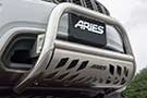A SUV sporting a 3-inch polished stainless bull bar by Aries Automotive