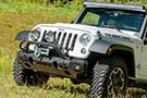 Jeep Wrangler JK sporting a front tow hook by Aries Automotive