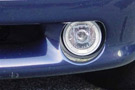 Hella Optilux 2500 Angel Eyes Driving Lamp installed on a blue vehicle
