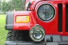 Delta Quad-Bar Halogen Headlights on a Jeep