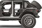 Slant Back Tire Carrier by Fab Fours mounted on a Wrangler JK