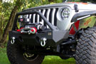 Angled view of a Jeep JL with Fishbone Offroad Mako Front Bumper