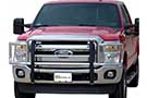 Chrome Go Industries Big Tex Grille Guard installed on a red Ford Pickup