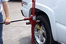 Hi-Lift Lift-Mate utilized with truck's wheel