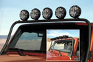 Jeep Wrangler sporting KC overhead windshield light bar