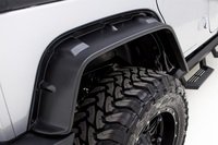 Lund rear flat-style fender flare in smooth black with black bolts