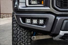 N-Fab Fog Light Brackets installed on a Ford F-150 Raptor with lights mounted