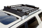 N-Fab's black powder-coated aluminum modular roof rack with some lights mounted
