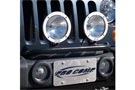 Pro Comp light bar with two off-road lights mounted on Jeep