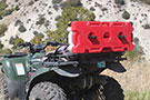 4 Gallon RotopaX Gasoline Pack mounted on ATV's rear