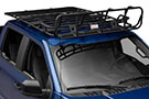 Smittybilt Defender Roof Rack Light Cage installed on vehicle's roof