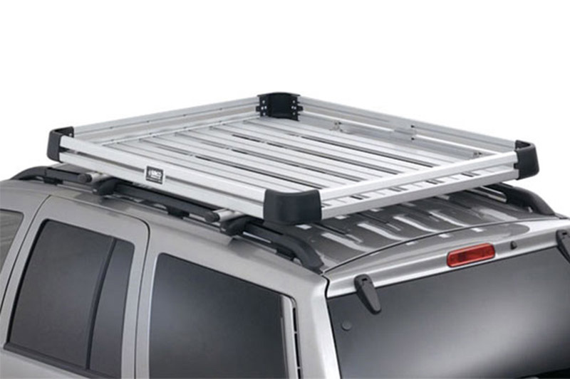Silver Surco Urban Roof Rack installed on vehicle's roof