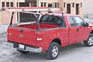 TracRac T-Rac Truck Rack on a red Ford pickup truck