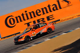 Continental tires car racing around a corner