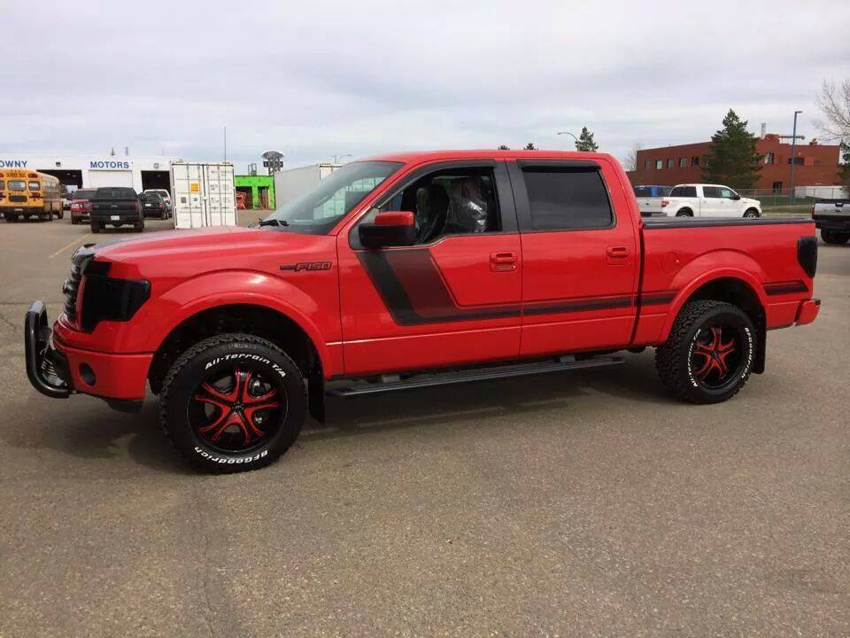 Red Ford F-150 with Platinum wheels