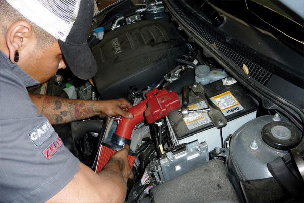 Man installing a intake