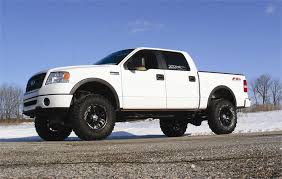 White Ford F-150 lifted