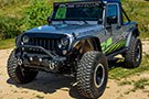 DV8 Mid Textured Black Front Bumper with Stinger on a Jeep Rubicon