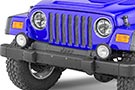 Delta Quad-Bar Halogen Headlights installed on Jeep Wrangler