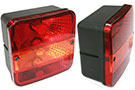 Pair of Delta LED Tail Lights in black housing with red lens