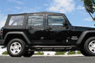 Jeep equipped with Factory Outlet Jeep Side Armor Black