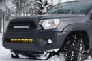 Toyota Tacoma sporting a KC LED truck grille