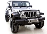 Lund smooth black flat-style fender flares on Jeep Wrangler