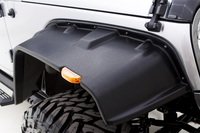 Lund front flat-style fender flare in textured black with black bolts
