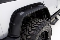 Lund rear flat-style fender flare in textured black with black bolts