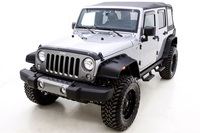 Jeep Wrangler sporting Lund flat-style fender flares in textured black finish