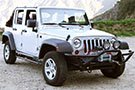 Jeep Wrangler sporting a complete front winch bumper in black finish